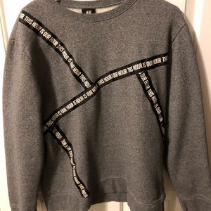 Gray sweatshirt with black ribbon